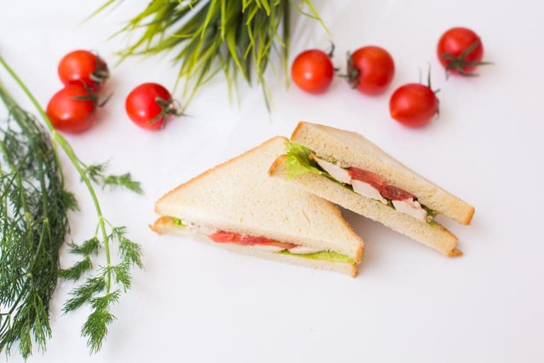 sandwich, sandwich on a white plate. Food delivery