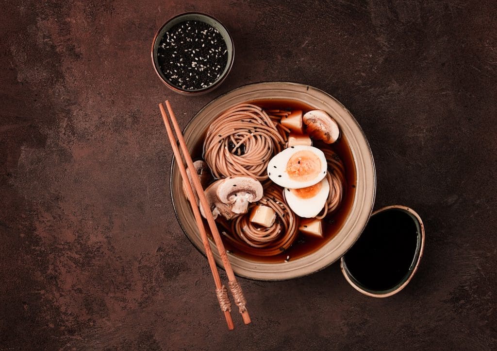 Asian soba soup, with mushrooms and egg, cheese, sesame seeds, homemade, no people,