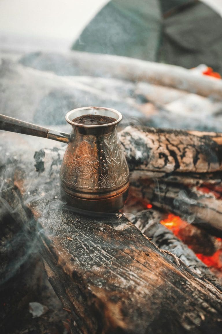 black turkish coffee cooking on the fire