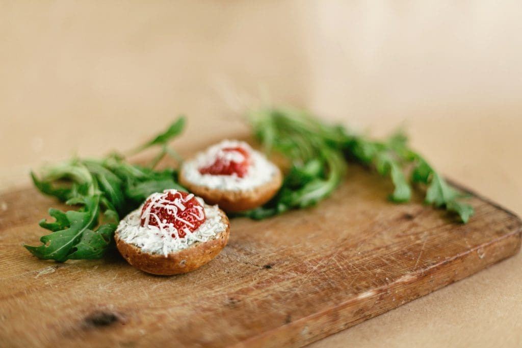Canape with gorgonzola parmezan and strawberry and arugula